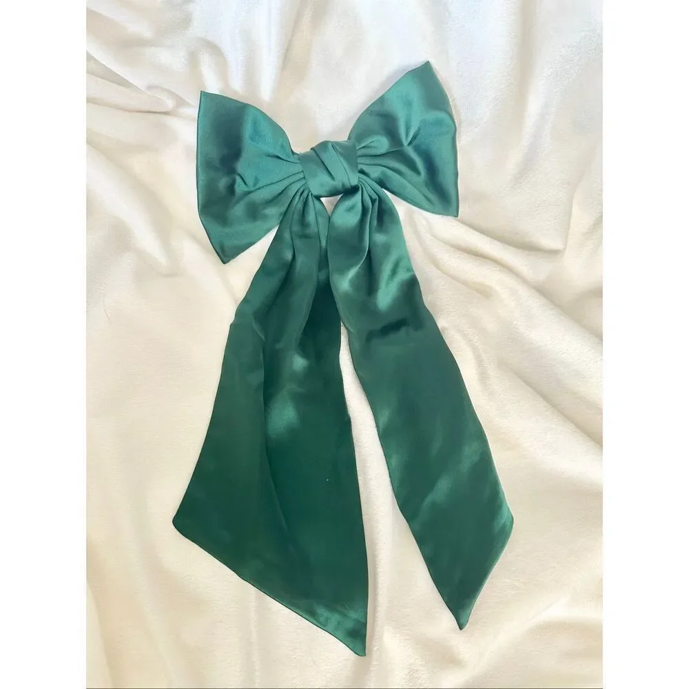Elegant green satin holiday bow - with Barrett clip close - great for thick hair